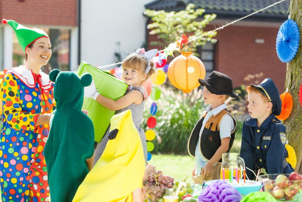 a teenager dressed up as a character at a kids birthday party