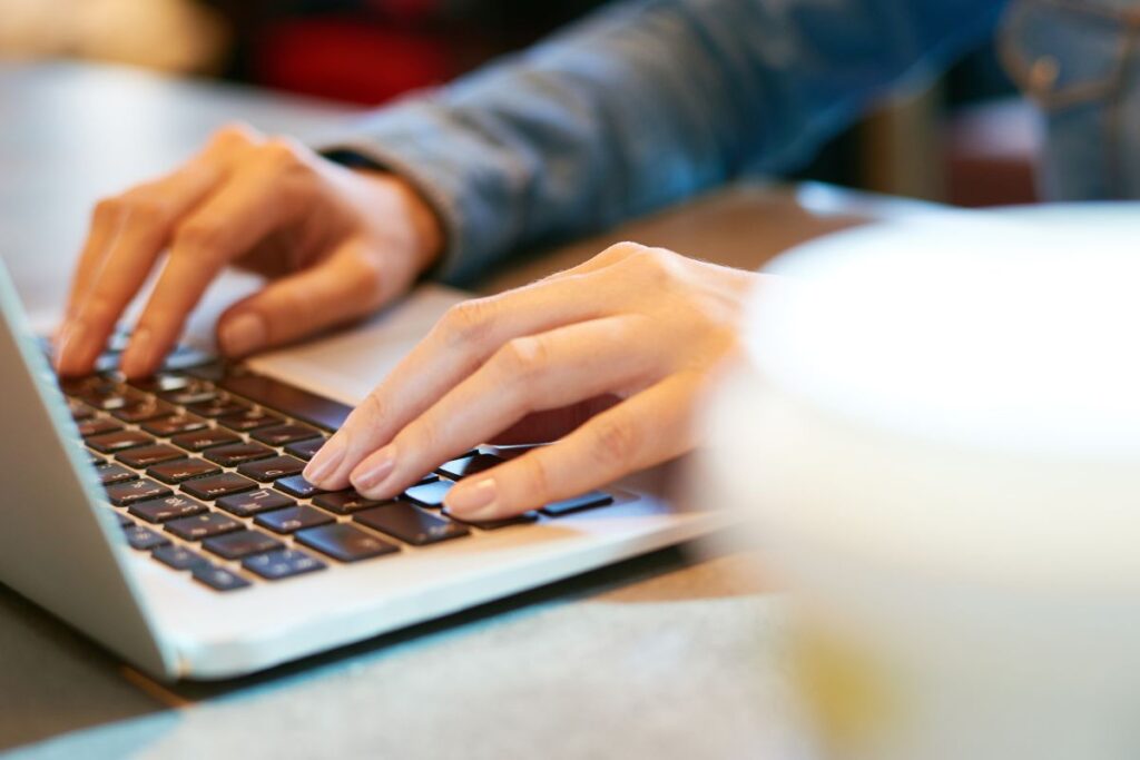 someone typing on a computer